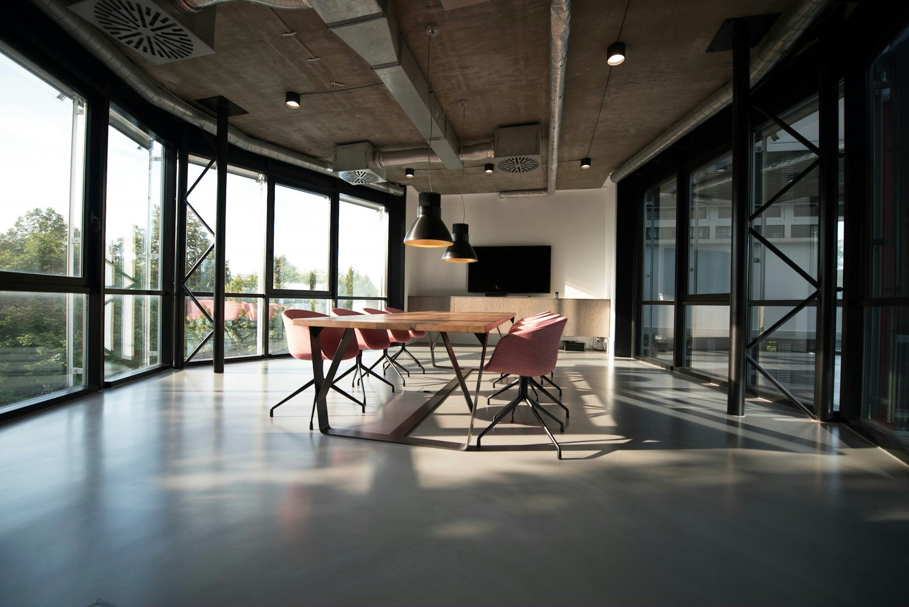 A bright modern boardroom prepared for an important ownership and growth discussion